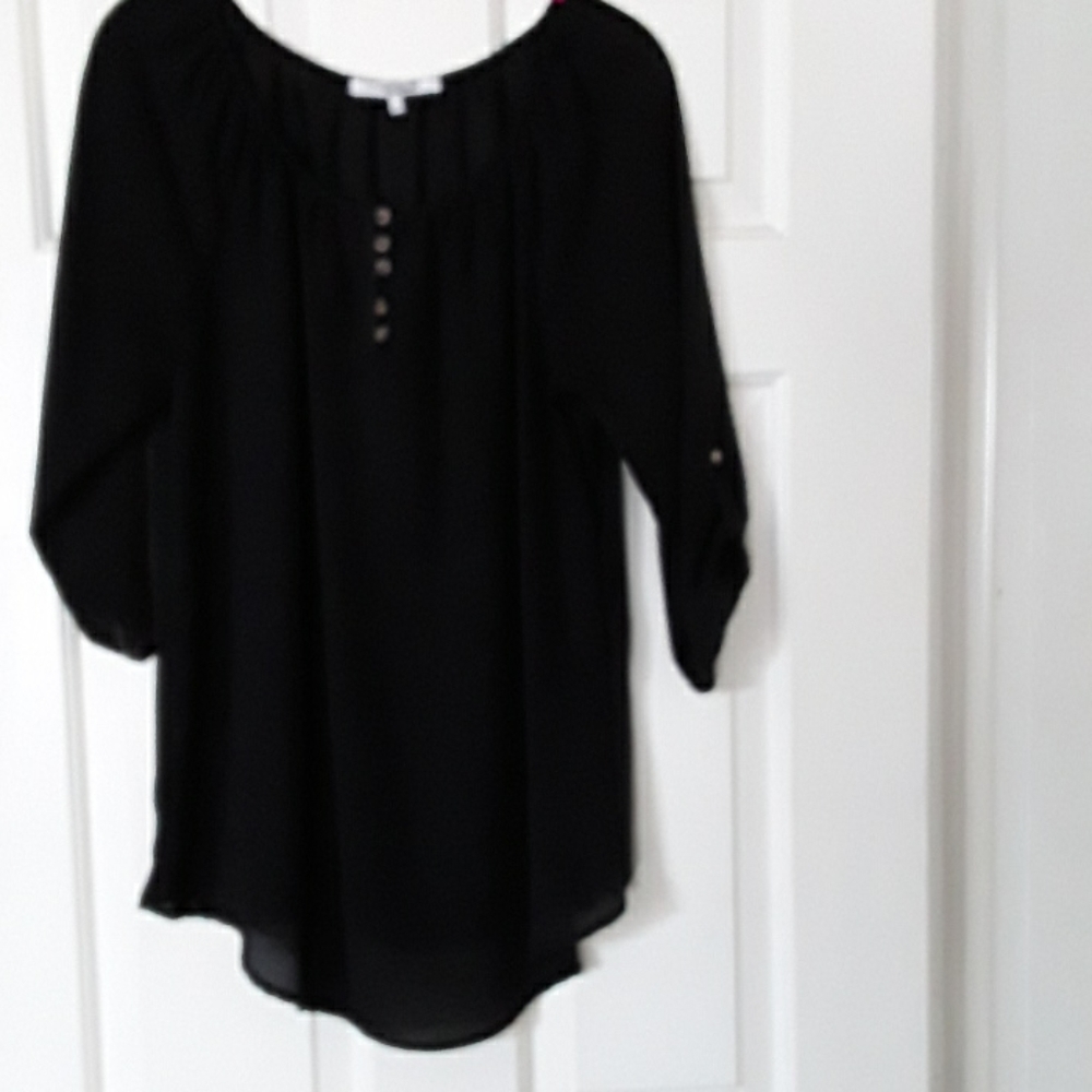 Lilac Clothing. Expected black shirt